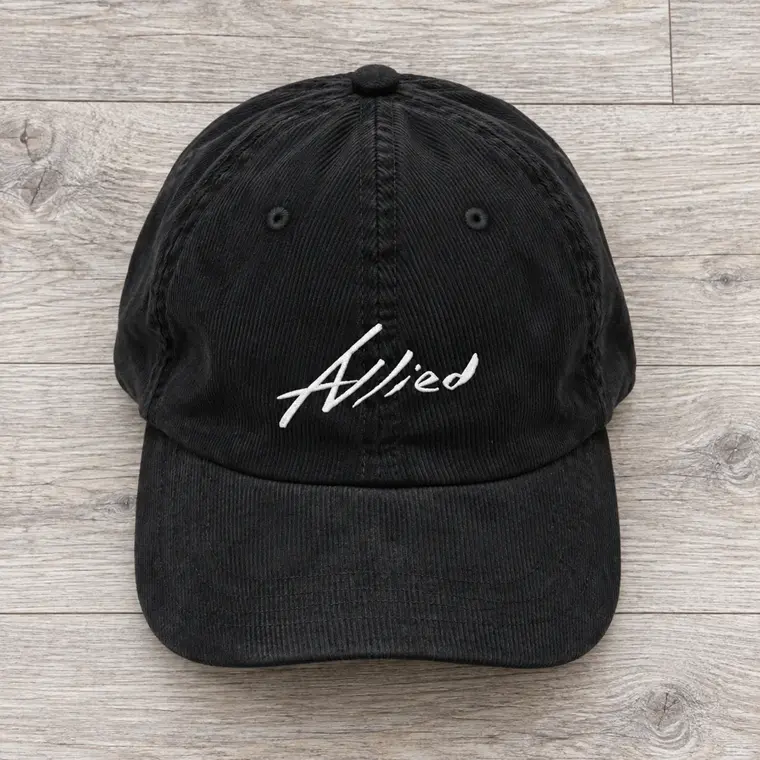 ALLIED - CAP — vista sobre madera
